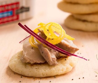 Buckwheat blinis with foie gras, fig and onion confit