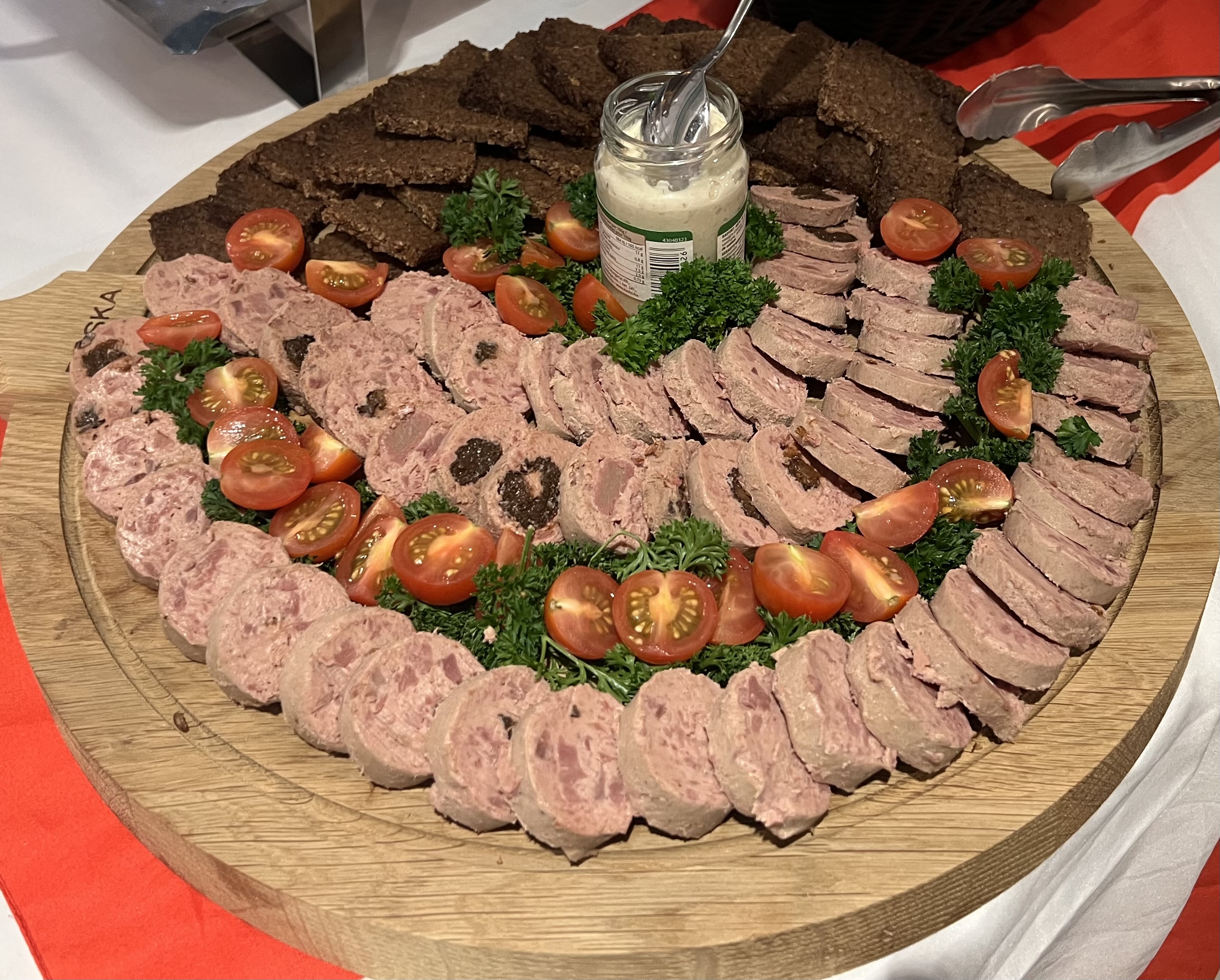 Cold game platter,rye bread and horseraddish