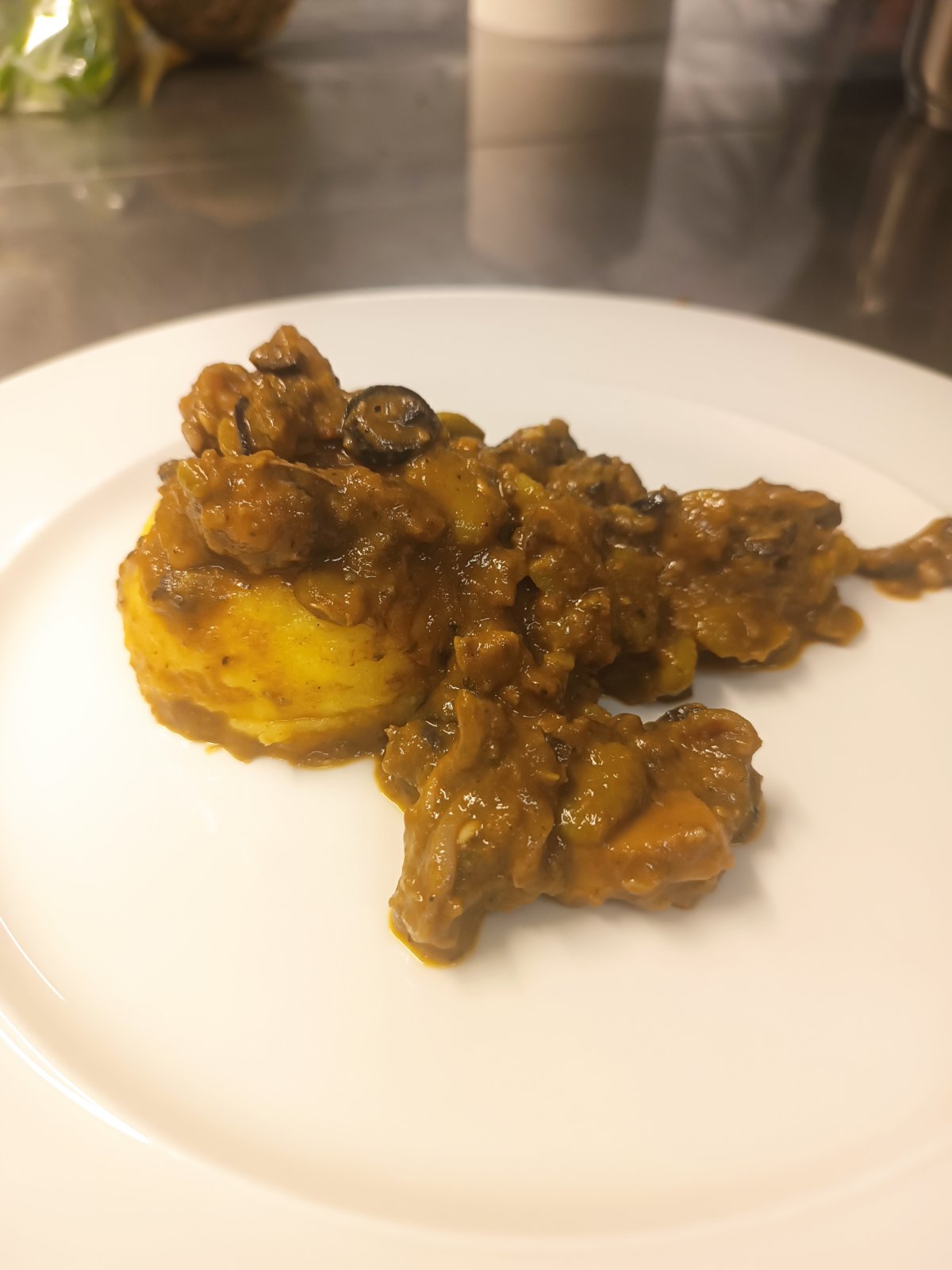 Cuttlefish with lima beans and polenta